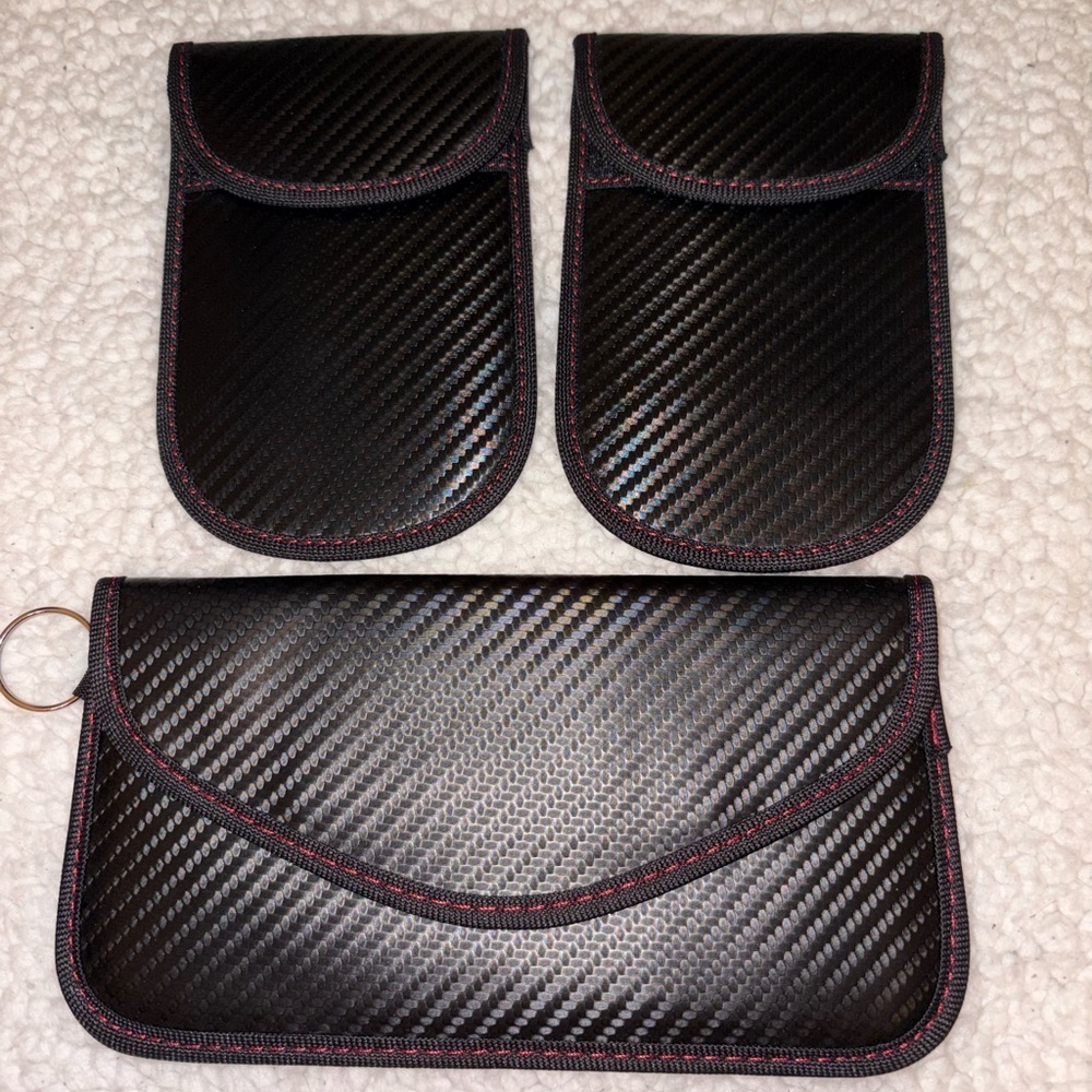 Three carbon fiber pouches w/keychains for Car registration, papers, etc. nwt